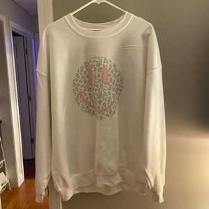 trendy smiley face crewneck